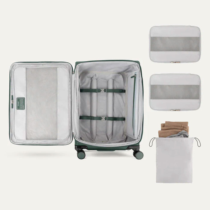 Interior Versapack+ Medium Check-in Spinner with packing cubes and a drawstring bag